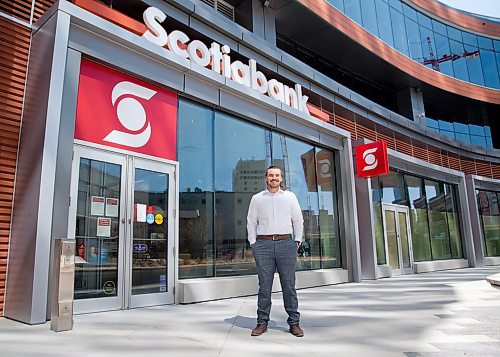 Mike Sudoma / Winnipeg Free Press
Winnipeg Blue Bomber, John Rush, outside of the Scotia Bank in True North Square where he also works as a Financial Advisor Wednesday afternoon
May 6, 2020