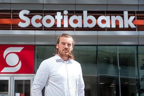 Mike Sudoma / Winnipeg Free Press
Winnipeg Blue Bomber, John Rush, outside of the Scotia Bank in True North Square where he also works as a Financial Advisor Wednesday afternoon
May 6, 2020