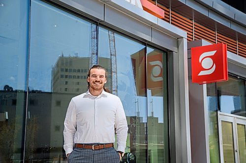 Mike Sudoma / Winnipeg Free Press
Winnipeg Blue Bomber, John Rush, outside of the Scotia Bank in True North Square where he also works as a Financial Advisor Wednesday afternoon
May 6, 2020