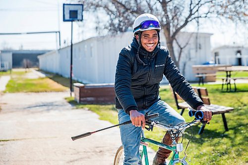 MIKAELA MACKENZIE / WINNIPEG FREE PRESS

Jockey Stanley Chadee rides up to the office at the Assiniboia Downs in Winnipeg on Wednesday, May 6, 2020. For Mike S story.

Winnipeg Free Press 2020