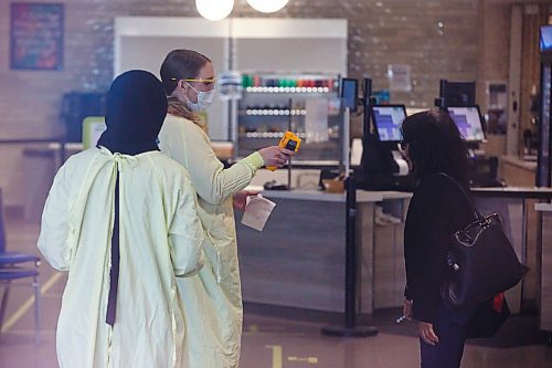 MIKE DEAL / WINNIPEG FREE PRESS
24-hr project - 2pm
Healthcare workers screen every person that enters the Grace General Hospital Wednesday afternoon. 
See Danielle Da Silva story
200506 - Wednesday, May 06, 2020.