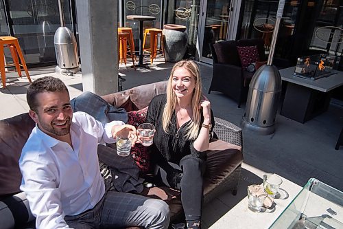 Mike Sudoma / Winnipeg Free Press
(Left to Right) Scott Jenkins and Sarah hill enjoy a drink on the patio of Browns Social House Wednesday afternoon
May 6, 2020