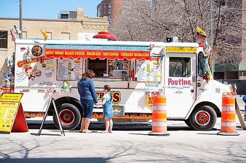 Mike Sudoma / Winnipeg Free Press
Pat Harrison and her Grand daughter, Erew Harrison wait for their food orders at Goldies Food Truck Wednesday afternoon
May 6, 2020