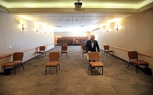 JASON HALSTEAD / WINNIPEG FREE PRESS

Harry Froese, a licensed funeral director and embalmer, prepares the chapel at Friends Funeral Chapel on May 6, 2020 for a socially-distanced funeral service. (See Sarah Lawrynuik COVID-19 24-hour story)