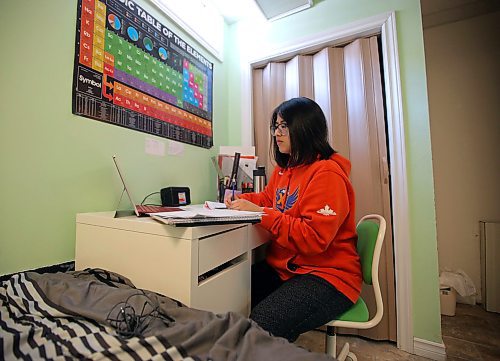 JASON HALSTEAD / WINNIPEG FREE PRESS

Maples Collegiate student Angela Arevalo works at home via a video-conferencing app with her Grade 12 pre-calculus math teacher Dariusz Piatek. Arevalo is preparing to study science at the University of Manitoba in the fall. While she's getting the hang of online schooling, she misses in-person instruction and the ability to ask questions easily. (See Maggie Macintosh COVID-19 24-hour story)