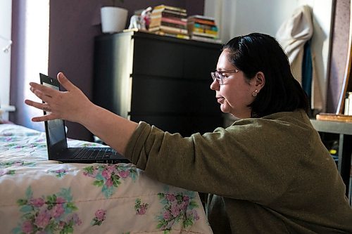 MIKAELA MACKENZIE / WINNIPEG FREE PRESS

Frances Koncan does a quick interview with Eddie after he went on a digital first date with Leah Borchert in her bedroom in Winnipeg on Wednesday, May 6, 2020. For Frances story.

Winnipeg Free Press 2020