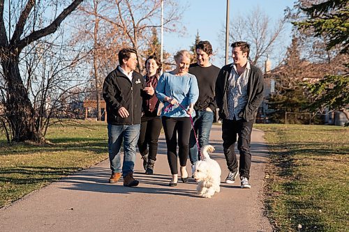 Mike Sudoma / Winnipeg Free Press
Lanette Siragusa (centre) and her family (left to right) Stino, Amanda, Austin and Jared) enjoy a walk along their favourite path Wednesday evening.
May 6, 2020