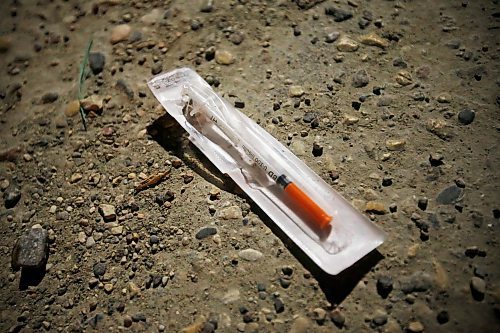 JOHN WOODS / WINNIPEG FREE PRESS
Joel Hildebrand, Downtown Watch Ambassador, left, and Perry Squires, Downtown Watch Ambassador supervisor found this needle as they walk the streets of downtown Winnipeg Wednesday, May 6, 2020. 

Reporter: Allen/Part of 24 hr life during COVID-19 project