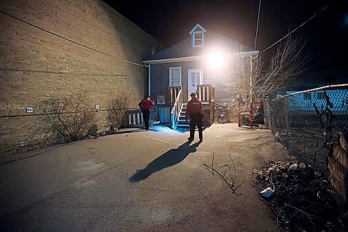 JOHN WOODS / WINNIPEG FREE PRESS
Joel Hildebrand, Downtown Watch Ambassador, right, and Perry Squires, Downtown Watch Ambassador supervisor look behind a resident that had a homeless camp behind it as they walk the streets of downtown Winnipeg Wednesday, May 6, 2020. 

Reporter: Allen/Part of 24 hr life during COVID-19 project