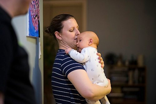 MIKAELA MACKENZIE / WINNIPEG FREE PRESS

Dawn McDonald carries her six-week-old, Henry Sulkers, down the hallway in their home in Winnipeg on Wednesday, May 6, 2020. For Leesa story.

Winnipeg Free Press 2020