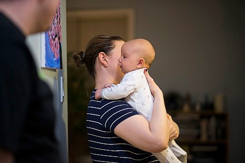 MIKAELA MACKENZIE / WINNIPEG FREE PRESS

Dawn McDonald carries her six-week-old, Henry Sulkers, down the hallway in their home in Winnipeg on Wednesday, May 6, 2020. For Leesa story.

Winnipeg Free Press 2020