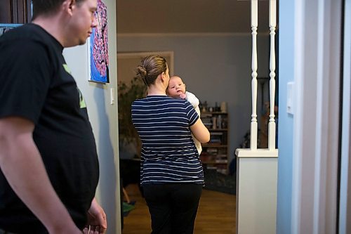 MIKAELA MACKENZIE / WINNIPEG FREE PRESS

Dawn McDonald carries her six-week-old, Henry Sulkers, down the hallway in their home in Winnipeg on Wednesday, May 6, 2020. For Leesa story.

Winnipeg Free Press 2020