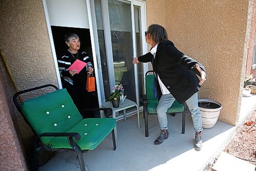 JOHN WOODS / WINNIPEG FREE PRESS
Keeping in mind COVID-19 distance protocols Lesly Katz visits her mother Lillian Greenfeld and reaches out for a pretend hug at Shaftsbury Park Retirement Residence on Mothers Day in Winnipeg Sunday, May 10, 2020. 

Reporter: ?