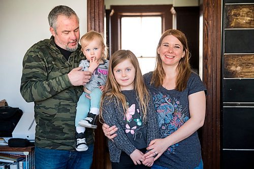 MIKAELA MACKENZIE / WINNIPEG FREE PRESS

Jenny and Steve Tyrrell and their kids, Liv (six) and Billie (one), pose for a portrait in their home in Selkirk on Monday, May 11, 2020. Jenny and Steve own Miss Browns, a sandwich shop in Winnipeg. They've close the operation entirely and have spent the last number of weeks experimenting in the kitchen, cooking with their kids and taking stock of their business. For Eva Wasney story.

Winnipeg Free Press 2020