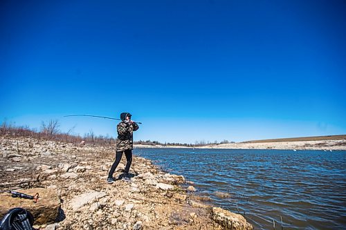MIKAELA MACKENZIE / WINNIPEG FREE PRESS

Raelynne Cross casts her line after pulling in her first fish of the season (a freshwater drum) on the Red River Floodway near Lockport on Monday, May 11, 2020. The season opened up on May 9th. Standup.

Winnipeg Free Press 2020
