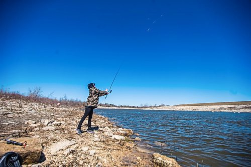 MIKAELA MACKENZIE / WINNIPEG FREE PRESS

Raelynne Cross casts her line after pulling in her first fish of the season (a freshwater drum) on the Red River Floodway near Lockport on Monday, May 11, 2020. The season opened up on May 9th. Standup.

Winnipeg Free Press 2020