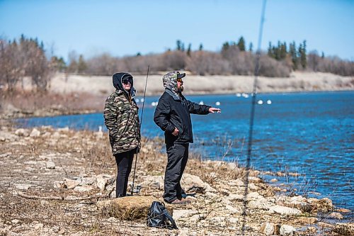 MIKAELA MACKENZIE / WINNIPEG FREE PRESS

Raelynne Cross and partner Carlos Oliveira fish on the Red River Floodway near Lockport on Monday, May 11, 2020. The season opened up on May 9th. Standup.

Winnipeg Free Press 2020