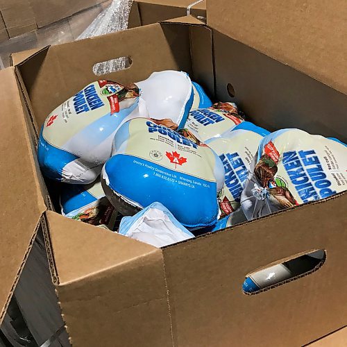 Canstar Community News Some of the frozen chickens donated to Winnipeg Harvest on April 23.