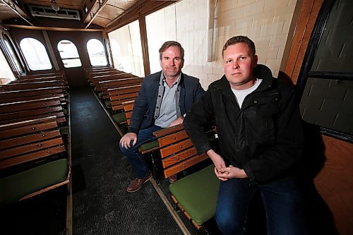 JOHN WOODS / WINNIPEG FREE PRESS
Steven Stothers, left, and Ben Gillies, co-owners of The Winnipeg Trolley Company are photographed in their mothballed tour bus in Winnipeg Monday, May 11, 2020. The Winnipeg Trolley will not be running this summer. COVID-19 distancing requirements mean they cant carry enough passengers to be profitable.

Reporter: Wasney