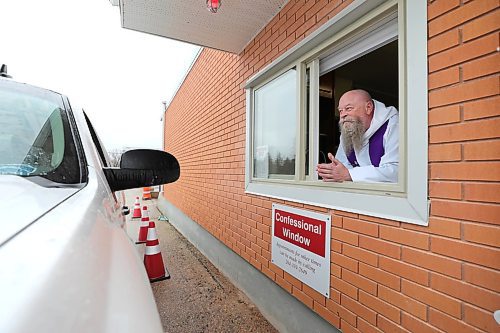 RUTH BONNEVILLE / WINNIPEG FREE PRESS

Local Standup - Confessional Window

Father David Kowalski of St. Theresa's Roman Catholic Church in West Saint Paul, chats with one of his long-time parishioners through his newly installed confessional window prior to opening the drive-thru confessional onThursday.  Father Kowalski has been operating the drive-thru since April 1st from a heated trailer in the parking lot  but now as a newly installed confessional window that was cut into the wall of the church last week and can be accessed from inside the church.  The drive thru confessional is open Thursday, Friday Saturday from 4 - 5 pm and by appointment.  

May 14, 2020