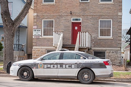 Mike Sudoma / Winnipeg Free Press
A Winnipeg Police cruiser sits outside of a Redwood Ave apartment block Saturday morning where a homicide had taken place late Friday morning.
May 16, 2020