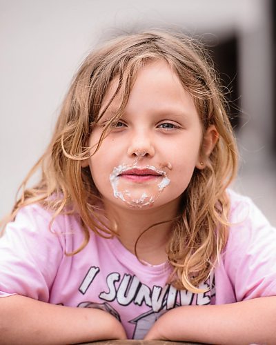 Mike Sudoma / Winnipeg Free Press
Autumn Carroll proudly displays a messy, post ice cream cone face while her and her family enjoy a Saturday afternoon at the Forks.
May 16, 2020
