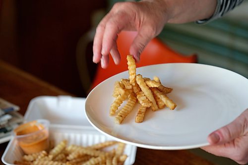 SHANNON VANRAES / WINNIPEG FREE PRESS
Crinkle-cut fries from Mercy Me Nashville Chicken as delivered to a Winnipeg home on May 20, 2020.