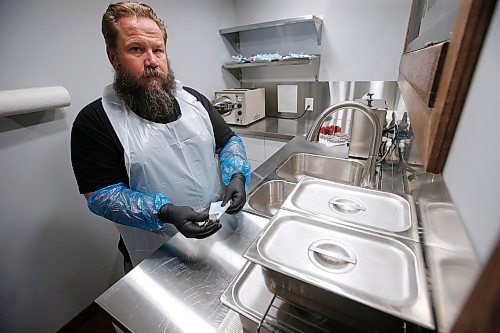 JOHN WOODS / WINNIPEG FREE PRESS
Rich Handford, owner of Kapala Tattoo, is photographed in the sterilization room on Thursday, May 21, 2020. Tattoo studios are part of Manitobas COVID-19 phase 2 re-opening plans.

Reporter: Rollason