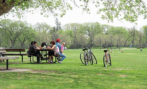 Mike Sudoma / Winnipeg Free Press
A group of people take a break from their bikes and relax at a picnic table in Assiniboine Park Saturday morning
May 23, 2020