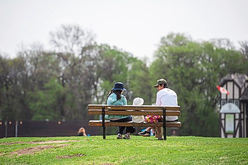 Mike Sudoma / Winnipeg Free Press
A family shares a moment while taking in the beautiful summer weather in Assiniboine Park Saturday morning
May 23, 2020
