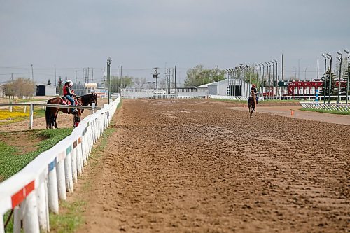 JOHN WOODS / WINNIPEG FREE PRESS
A rider is photographed training at the track at Assiniboia Downs Sunday, May 24, 2020. The Downs is opening their race season tomorrow with an empty grandstand. The races will be televised and online.

Reporter: Allen