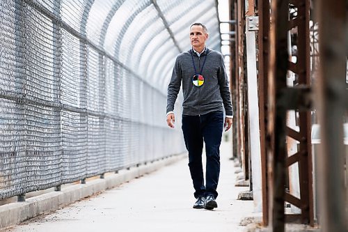 JOHN WOODS / WINNIPEG FREE PRESS
Kevin Chief, former educator/advocate and politician, walks on the Arlington Bridge in his old North End stomping grounds Tuesday, May 26, 2020. Chief is opening up about his past.

Reporter: May