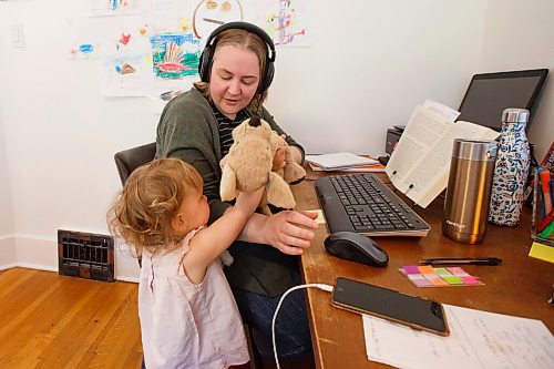 MIKE DEAL / WINNIPEG FREE PRESS
Alana Conway is a research assistant at the Canadian Museum for Human Rights. These days, instead of the museum, her workspace is her bedroom  she can touch her bed from her desk  and her co-workers are two kids, Julian, 5, and Josephine, 2.
See Jen Zoratti story
200527 - Wednesday, May 27, 2020.