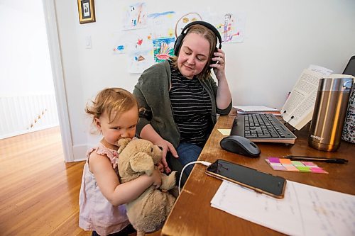 MIKE DEAL / WINNIPEG FREE PRESS
Alana Conway is a research assistant at the Canadian Museum for Human Rights. These days, instead of the museum, her workspace is her bedroom  she can touch her bed from her desk  and her co-workers are two kids, Julian, 5, and Josephine, 2.
See Jen Zoratti story
200527 - Wednesday, May 27, 2020.