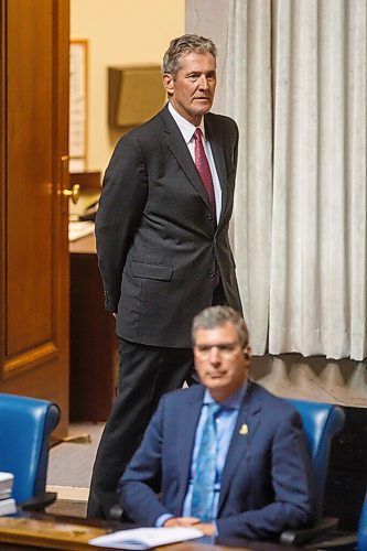 MIKE DEAL / WINNIPEG FREE PRESS
Premier Brian Pallister heads to his seat as a limited number of MLA's were in the legislative chamber Wednesday as part of the measures to deal with the coronavirus continue. 
200527 - Wednesday, May 27, 2020.