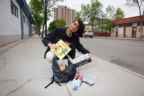 MIKE DEAL / WINNIPEG FREE PRESS
Michael Redhead Champagne with some of his supplies, books and art supplies, that he hands out to homeschooling families.
see Brenda Suderman story
200528 - Thursday, May 28, 2020.