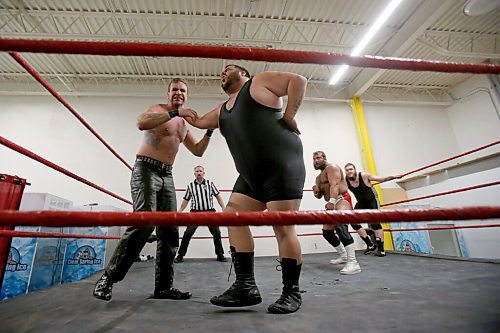SHANNON VANRAES / WINNIPEG FREE PRESS
AJ Laroque, who wrestles with the CWE under the name The Canadian Crusher AJ Sanchez, grabs The Mastermind Kevin Cannon as they prepare for an upcoming show on May 27, 2020.