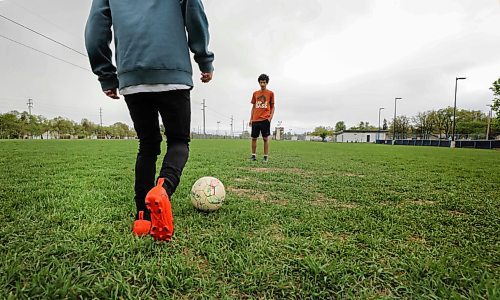 RUTH BONNEVILLE / WINNIPEG FREE PRESS

Sports - Soccer drills

A small group of teenage boys who normally play in a recreational soccer U15  soccer league practice some soccer drills at Sir John Franklin Soccer Field Thursday afternoon.  

Names:  Zevi Nathanson (blue hoodie) and  Ariel Luquer (orange t-shirt) 
May 28, 2020