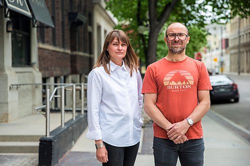 MIKAELA MACKENZIE / WINNIPEG FREE PRESS

Siblings Jennifer Goreski and Jon Thiessen, who have watched their mother's dementia deteriorate rapidly during isolation, pose for a portrait outside of their luggage shop in Winnipeg on Friday, May 29, 2020. For Eva Wasney story.
Winnipeg Free Press 2020.