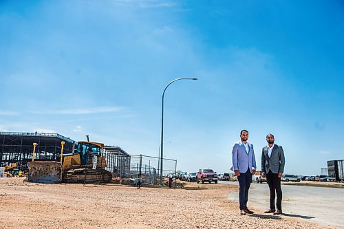 MIKAELA MACKENZIE / WINNIPEG FREE PRESS

Satpal Sidhu, president (left), and Amrit Jhand, CEO, pose for a portrait by construction at the development site in Winnipeg on Monday, June 1, 2020. For Marty Cash story.
Winnipeg Free Press 2020.