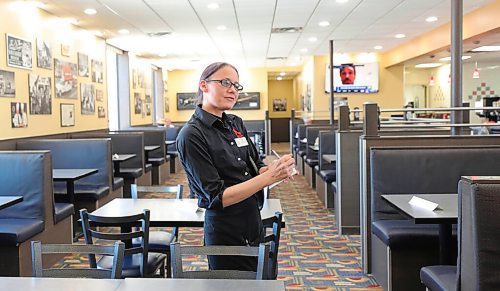 RUTH BONNEVILLE / WINNIPEG FREE PRESS

Local - Sals Restaurant 

Salisbury House server, Jennifer Check, takes a customers order inside the restaurant on  Monday on their first day of re-opening since closing in March due to COVID>. 

June 1, 2020