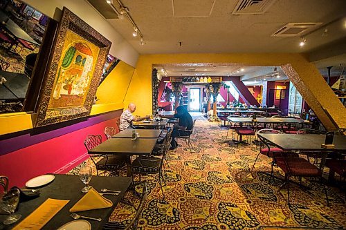 MIKAELA MACKENZIE / WINNIPEG FREE PRESS

Dave Lysyk (left) and Raj Santiago dine at the East India Company on re-opening day in Winnipeg on Monday, June 1, 2020. For Malak Abas story.
Winnipeg Free Press 2020.