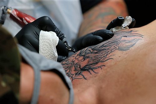 JOHN WOODS / WINNIPEG FREE PRESS
Rich Handford, owner of Kapala Tattoo, works on a clients tattoo on the first day of COVID phase 2 opening Monday, June 1, 2020. 

Reporter: Rollason