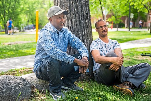 MIKAELA MACKENZIE / WINNIPEG FREE PRESS

Nuun Ahmed (left) and Said Harir Omar talk about race, skin colour, and discrimination at Central Park in Winnipeg on Tuesday, June 2, 2020. For Malak Abas story.
Winnipeg Free Press 2020.