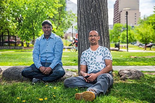 MIKAELA MACKENZIE / WINNIPEG FREE PRESS

Nuun Ahmed (left) and Said Harir Omar talk about race, skin colour, and discrimination at Central Park in Winnipeg on Tuesday, June 2, 2020. For Malak Abas story.
Winnipeg Free Press 2020.