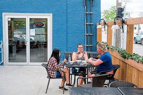 Daniel Crump / Winnipeg Free Press. (L to R) Si-Ting Polkowski, Barb Polkowski and Don Fletcher enjoy a meal on the patio at Dug + Bettys restaurant in St. Boniface. June 2, 2020.