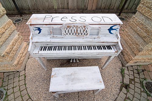 Mike Sudoma / Winnipeg Free Press
A piano painted white with the words Press On painted on top of it at Parc Joseph Royal in St Boniface Tuesday evening. This is one of the pieces among the many other Press on Winnipeg art displays scattered throughout the city.
June 2, 2020