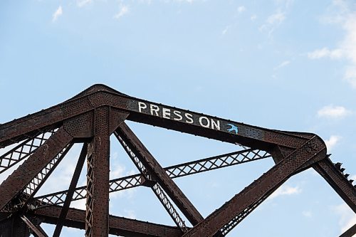 Mike Sudoma / Winnipeg Free Press
A Press On mural painted atop the train bridge above Waterfront Dr Tuesday evening.
June 2, 2020