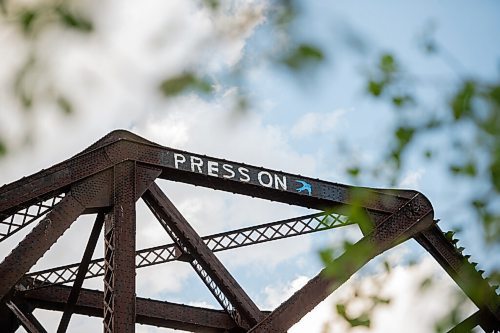 Mike Sudoma / Winnipeg Free Press
A Press On mural painted atop the train bridge above Waterfront Dr Tuesday evening.
June 2, 2020