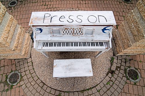 Mike Sudoma / Winnipeg Free Press
A piano painted white with the words Press On painted on top of it at Parc Joseph Royal in St Boniface Tuesday evening. This is one of the pieces among the many other Press on Winnipeg art displays scattered throughout the city.
June 2, 2020